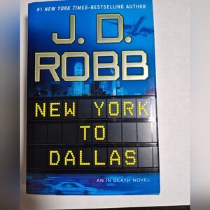 Year 2011 Hardcover novel  J.D Robb. New York to Dallas.